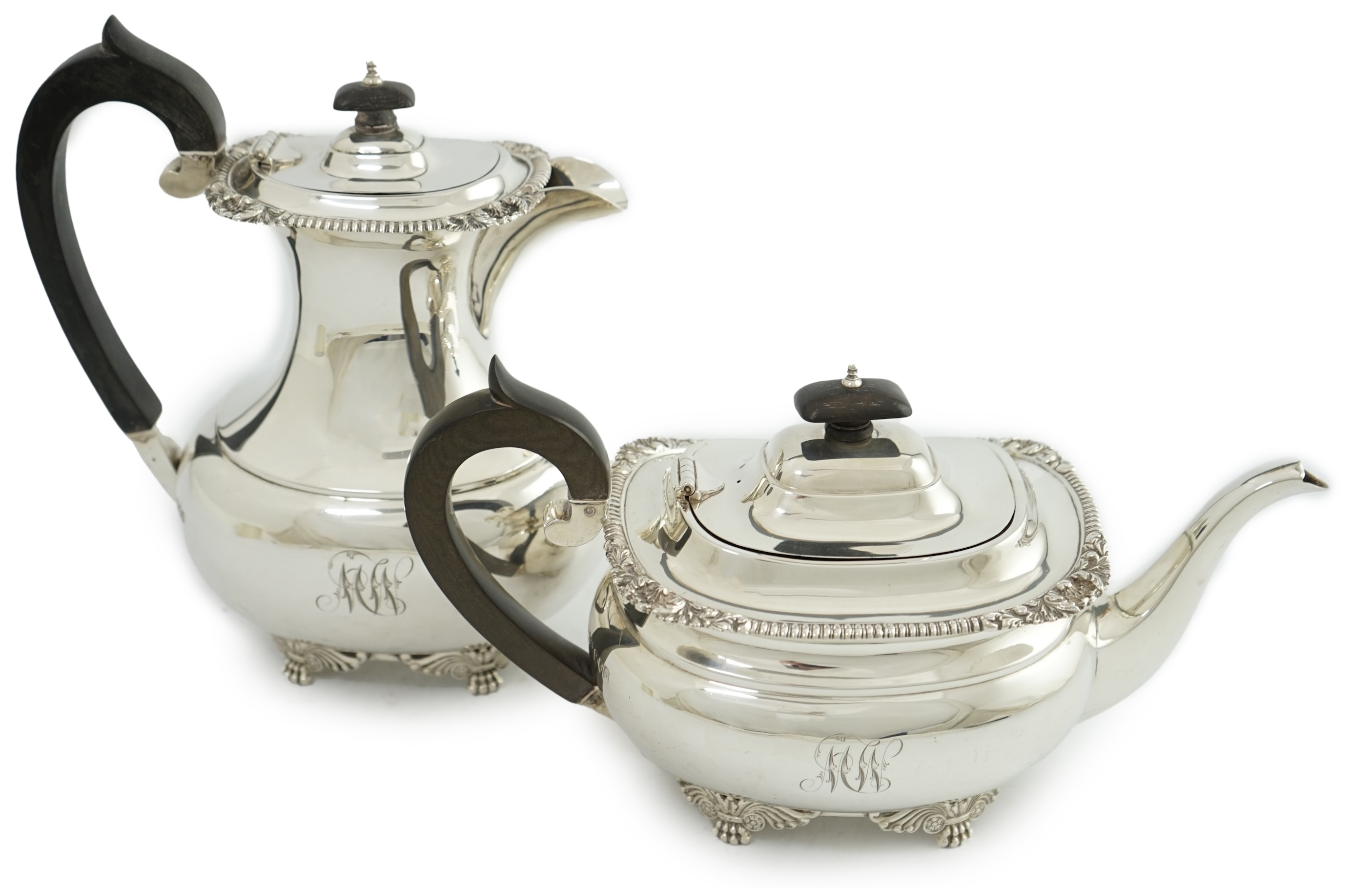 A George V silver hot water pot and matching teapot, by Reid & Sons